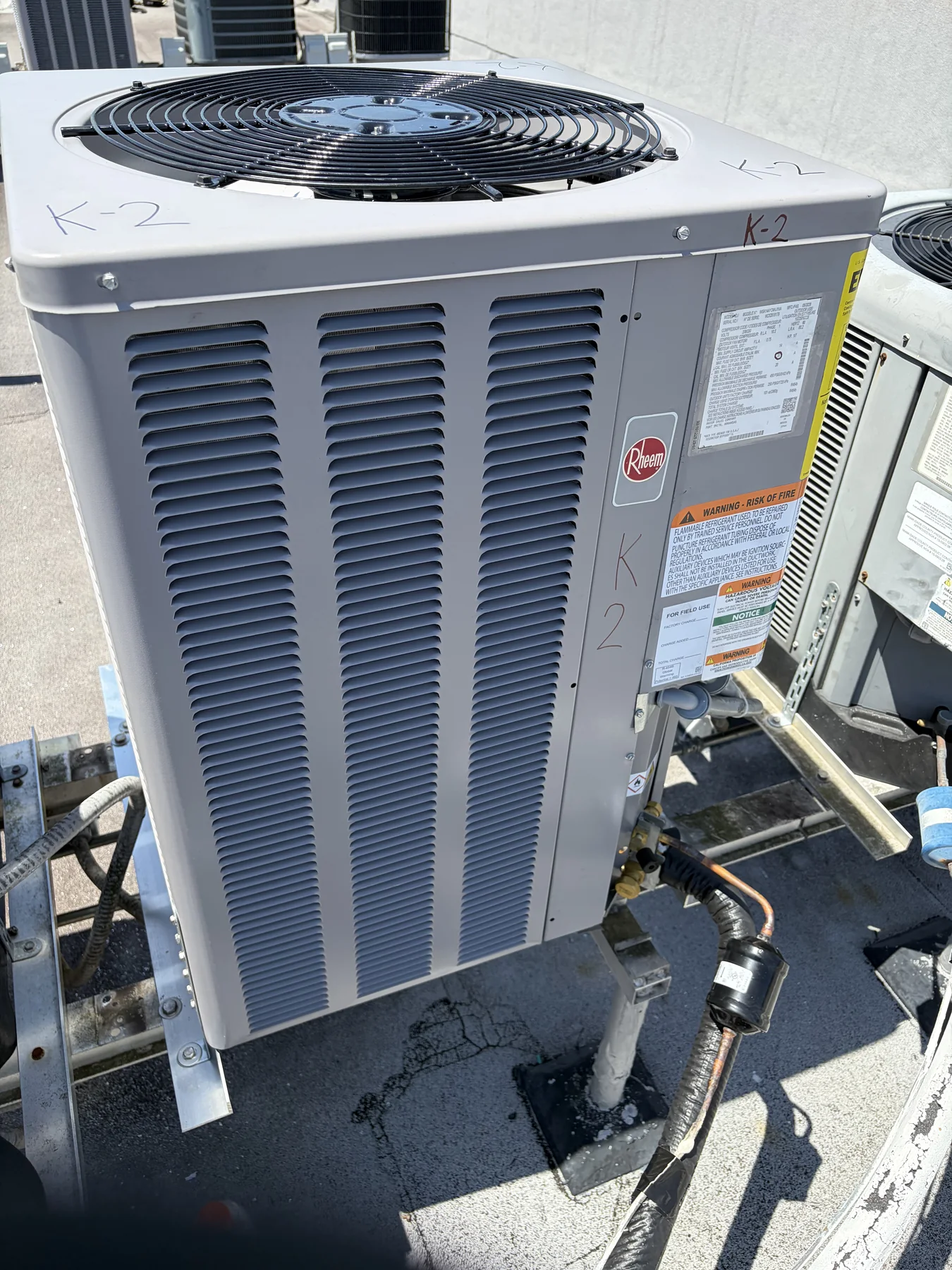 Rooftop HVAC installation work shown in a job photo